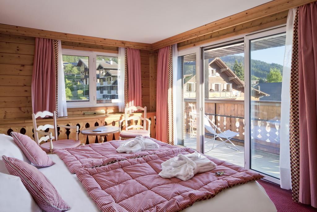 Chalet-Hotel La Marmotte, La Tapiaz & Spa, The Originals Relais Les Gets Pokoj fotografie